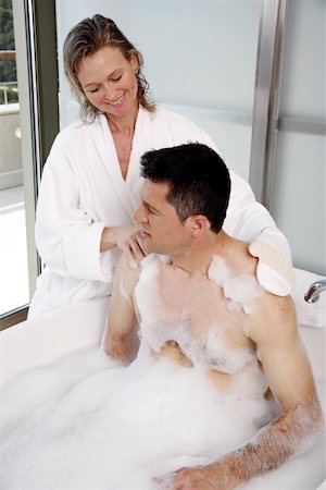 Mature couple having fun in the bathtub Stock Photo - Premium Royalty-Free, Code: 644-01436170