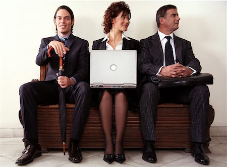 simsearch:645-01739992,k - Three people sitting in a waiting room Stock Photo - Premium Royalty-Free, Code: 644-01436188