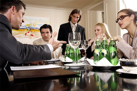 simsearch:645-01739861,k - Business people having a meeting Stock Photo - Premium Royalty-Free, Code: 644-01436215