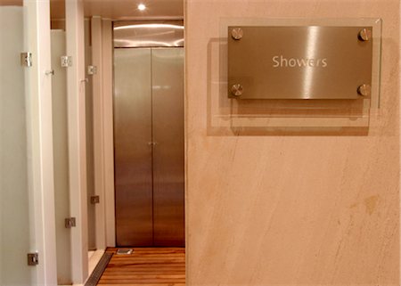 Sign indicating showers Stock Photo - Premium Royalty-Free, Code: 644-01436713