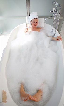 Mature woman enjoying bubble bath Stock Photo - Premium Royalty-Free, Code: 644-01436778
