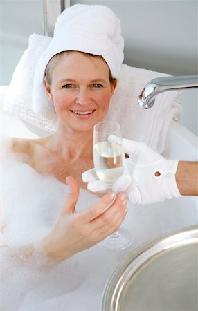 Mature woman enjoying bubble bath Stock Photo - Premium Royalty-Free, Code: 644-01436780