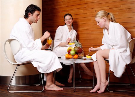 Friends having a refreshment after a spa treatment Stock Photo - Premium Royalty-Free, Code: 644-01437034