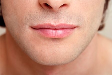 simsearch:644-01437946,k - Beauty shot of man's lips Foto de stock - Royalty Free Premium, Número: 644-01437098
