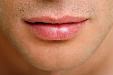 simsearch:644-01437946,k - Beauty shot of man's lips Foto de stock - Royalty Free Premium, Número: 644-01437099