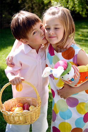 Little boy and girl with Easter egg basket Stock Photo - Premium Royalty-Free, Code: 644-01437240