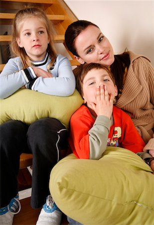 Mother with tired children on staircase Stock Photo - Premium Royalty-Free, Code: 644-01437255