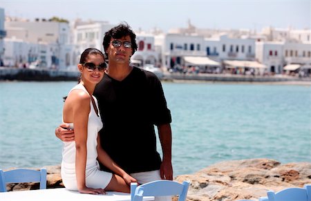 excited traveller - Couple posing with sea view Stock Photo - Premium Royalty-Free, Code: 644-01437267