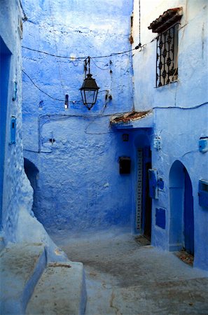 photography paint pigments - Blue alley with doorways Stock Photo - Premium Royalty-Free, Code: 644-01437444