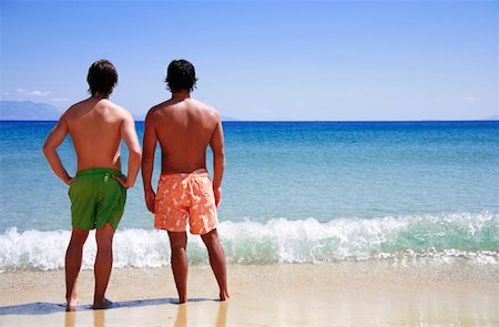 european man gay pic - Two men on the beach looking out to sea Stock Photo - Premium Royalty-Free, Code: 644-01437566