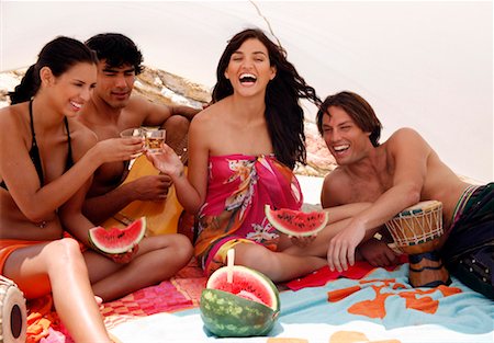 Two couples on beach having fun Stock Photo - Premium Royalty-Free, Code: 644-01437630