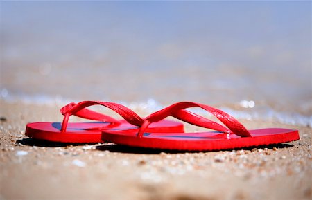 flip flops close - Flip flops on the beach Stock Photo - Premium Royalty-Free, Code: 644-01437854