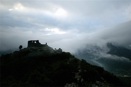 enigma - Stone ruin on a cloudy mountaintop Stock Photo - Premium Royalty-Free, Code: 644-01630798