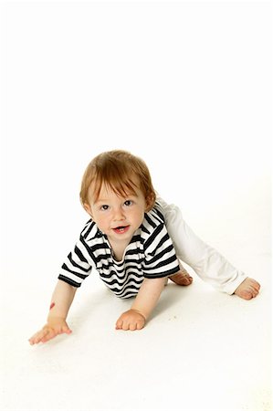 Boy crawling Stock Photo - Premium Royalty-Free, Code: 644-01630823