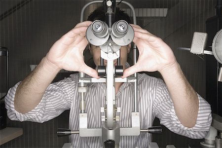 doctor eyes - Patient at optometrist Stock Photo - Premium Royalty-Free, Code: 644-01630988