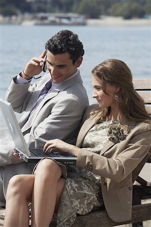 simsearch:644-01631428,k - Business couple on beach with cell phone and laptop Stock Photo - Premium Royalty-Free, Code: 644-01631108