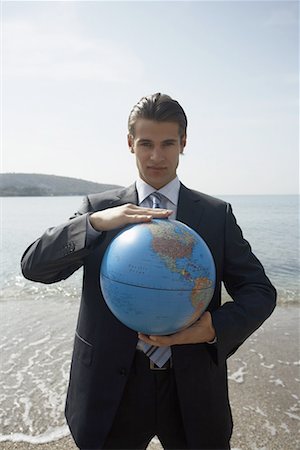 simsearch:644-01825796,k - Businessman on beach with globe Stock Photo - Premium Royalty-Free, Code: 644-01631123