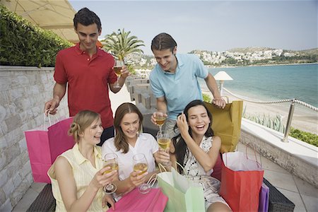 simsearch:644-01631512,k - Group of friends with shopping bags and wine Stock Photo - Premium Royalty-Free, Code: 644-01631218