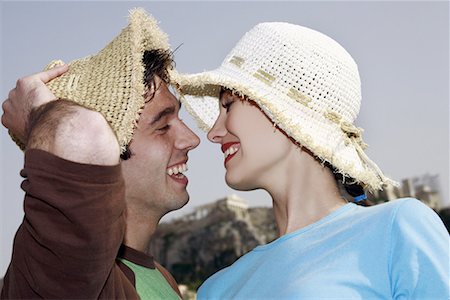 simsearch:644-01631409,k - Couple smiling before kissing Stock Photo - Premium Royalty-Free, Code: 644-01631408