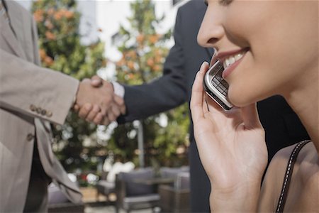 spanish male dress - Business people meeting in garden cafe Stock Photo - Premium Royalty-Free, Code: 644-01631428