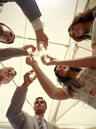 simsearch:644-01825398,k - Group of people with champagne glasses toasting Stock Photo - Premium Royalty-Free, Code: 644-01631516