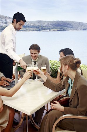 french cafe, people - Office workers having drinks in outdoor cafe Stock Photo - Premium Royalty-Free, Code: 644-01631511