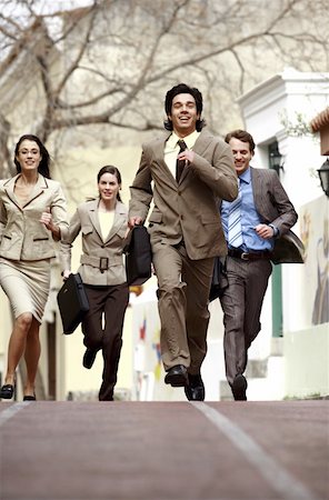 people running with briefcases - Business people running Stock Photo - Premium Royalty-Free, Code: 644-01825424