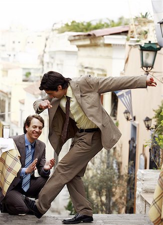 french cafe, people - Two businessmen Greek dancing Foto de stock - Sin royalties Premium, Código: 644-01825435