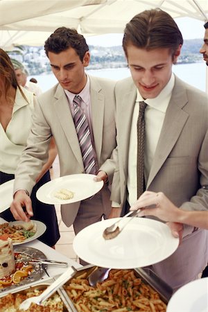 simsearch:644-01825398,k - Businessmen at lunch buffet Stock Photo - Premium Royalty-Free, Code: 644-01825800