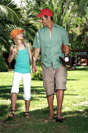 family baseball pictures - Father and daughter with baseball outfit Stock Photo - Premium Royalty-Free, Code: 644-02060494