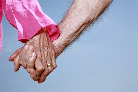 Closeup of senior couple holding hands Foto de stock - Sin royalties Premium, Código: 644-02060634