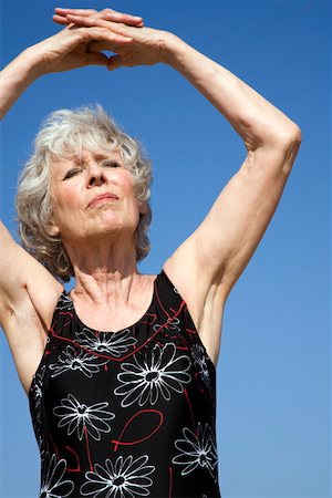 elderly yoga - Female senior stretching Stock Photo - Premium Royalty-Free, Code: 644-02060690