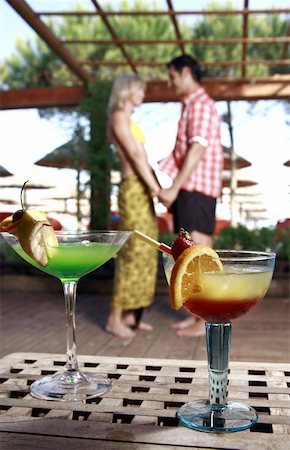 Cocktails with mature adult couple in background Stock Photo - Premium Royalty-Free, Code: 644-02060726