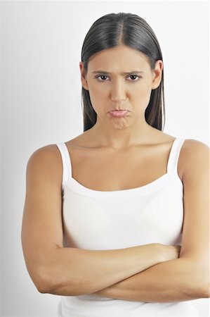 pouting - Female young adult;pouting Stock Photo - Premium Royalty-Free, Code: 644-02152728
