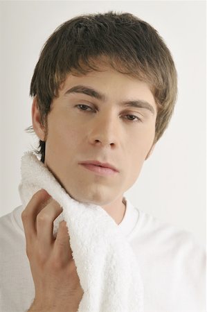 simsearch:644-02152773,k - Young male adult drying neck with towel Stock Photo - Premium Royalty-Free, Code: 644-02152789