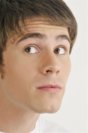 simsearch:644-02152773,k - Young male adult face;looking Stock Photo - Premium Royalty-Free, Code: 644-02152852