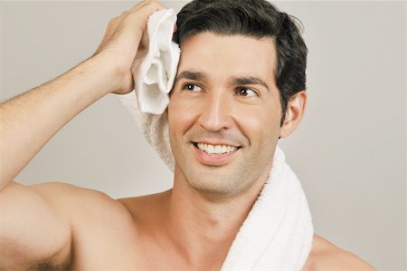 simsearch:644-02152773,k - Young male adult towel drying Stock Photo - Premium Royalty-Free, Code: 644-02153017