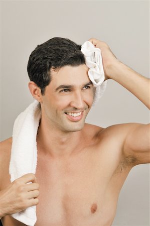 simsearch:644-02152773,k - Young male adult towel drying Stock Photo - Premium Royalty-Free, Code: 644-02153019