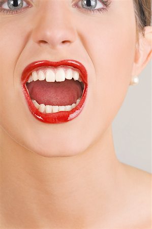 pictures of angry women mouths - Female young adult face;screaming Stock Photo - Premium Royalty-Free, Code: 644-02153044