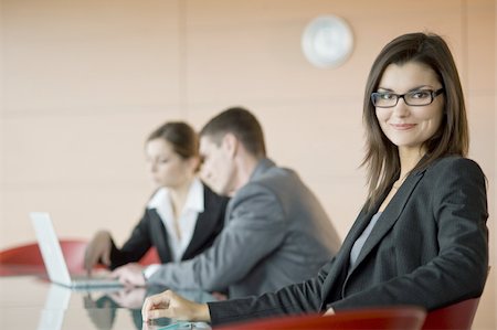 Business people at conference table Foto de stock - Sin royalties Premium, Código: 644-02923085