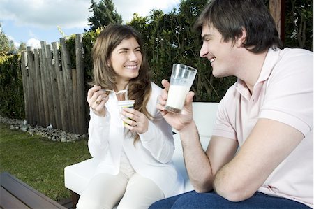 french cafe, people - Young couple having breakfast outdoors Stock Photo - Premium Royalty-Free, Code: 644-02923501