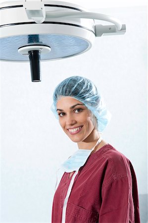 disinfettato - Surgeon in operating room Fotografie stock - Premium Royalty-Free, Codice: 644-03659495