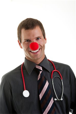 female doctor costume - Doctor with stethoscope and clown's nose Stock Photo - Premium Royalty-Free, Code: 644-03659576