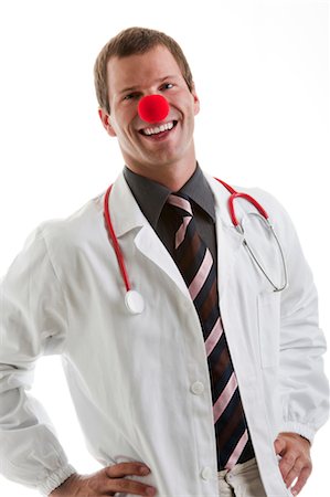 plaisanter - Médecin avec stéthoscope et nez de clown Photographie de stock - Premium Libres de Droits, Code: 644-03659581