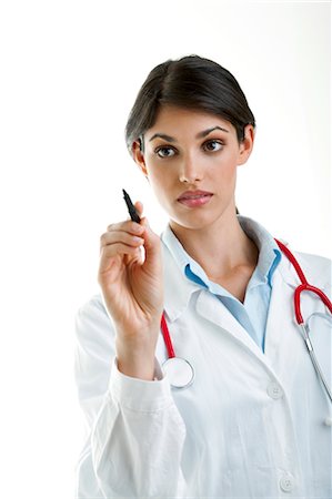 Doctor writing with pen Stock Photo - Premium Royalty-Free, Code: 644-03659624