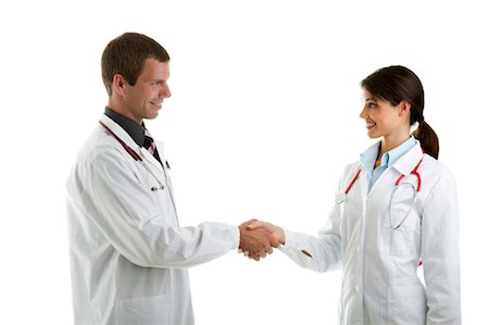 Two doctors shaking hands Stock Photo - Premium Royalty-Free, Code: 644-03659626