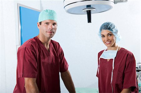 surgical staff - Medical personnel in operating room Stock Photo - Premium Royalty-Free, Code: 644-03672107