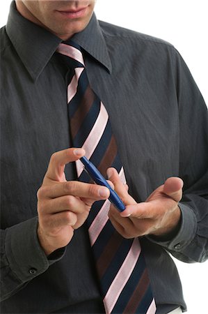 Man holding blood sugar test Foto de stock - Sin royalties Premium, Código: 644-03672127