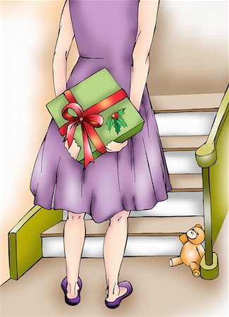 Mother holding a Christmas present behind her back Foto de stock - Sin royalties Premium, Código: 645-01538417