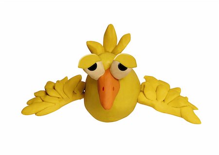 Yellow bird flying Stock Photo - Premium Royalty-Free, Code: 645-01538508
